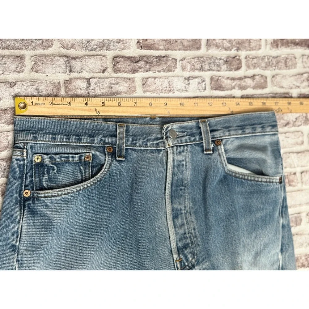 VTG Levis 501 Mens 33x30 Light Wash Jeans  Made USA Ripped Repair Distressed 90s